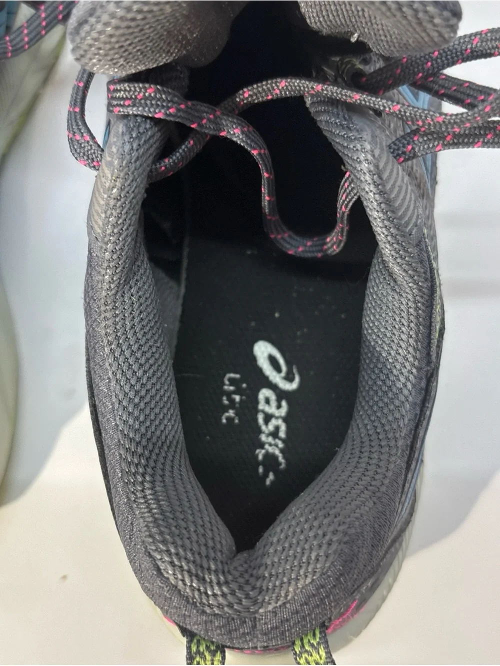 ASICS woman Gray Running Shoe with Blue Logo and Neon Accents  size 9